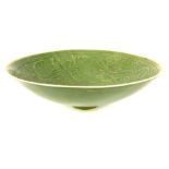 A Chinese celadon bowl. Decorated with flowers to interior.