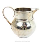 A Sterling Silver Milk Jug, Hallmarked London 1904