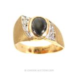 A Mens 10 Carat Gold Natural Black Sapphire and Diamond Ring.