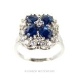 An 18 Carat White Gold Substantial Sapphire And Diamond Ring.