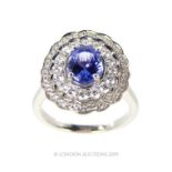 An 18 Carat White Gold Tanzanite and Diamond Ring.