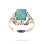 A 10 Carat White Gold Opal And Diamond Ring