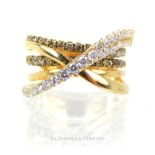 A 14 Carat Yellow gold Diamond Cross Over Ring.