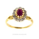 An 18 Carat Yellow Gold Ruby And Diamond Cluster Ring.