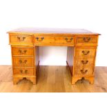 Pedestal Desk With Red Leather Top.