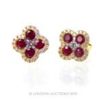 A Pair Of 18 Carat Yellow Gold Ruby And Diamond Earrings.