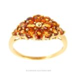 A Citrine Cluster Ring.