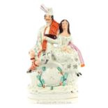 A Victorian (1850's) Staffordshire Flatback Of A Scottish Couple And Clock.