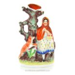 A Victorian (1850's) Staffordshire Flatback Spill Vase Of Little Red Riding Hood.