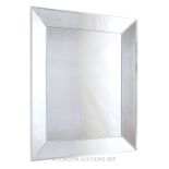 A Large Beveled Edged Mirror.