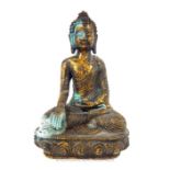 A Chinese Gilt Buddha.