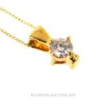 An 18 Carat Yellow Gold Diamond Pendant Necklace.