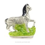 A Victorian Staffordshire Depicting A Zebra