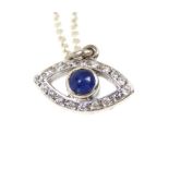 A White Gold Sapphire And Diamond Pendant Necklace.