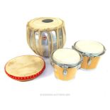 Two Indian Drums And A Pair Of Bongos.