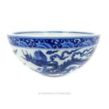 A Ming Style Blue And White Chinese Bowl Depicting Dragons.