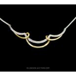 A 9 Carat Yellow and White Gold Diamond Necklace.