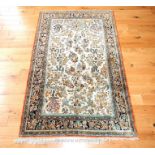 An Antique Persian Qum Silk Rug. 225 cm x 135 cm.