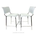 A Pair of Chrome Chairs With Plastic Weave Seats And Backing.