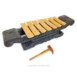 An African Hardwood Carved Xylophone.