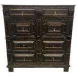 A 17th Century Oak And Ebony Inlaid Chest Of Drawers. 111 x 61 x 115 cm.