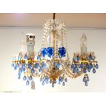 A Five Stem Chandelier With Blue And Clear Glass Droplets, Some Damage To Top.