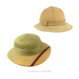 Two Pith Helmets. 34 x 28 x 7 cm.