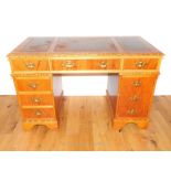 A Leather Topped Pedestal Desk.