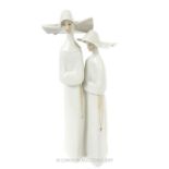 A LLadro Ceramic Statuette Depicting A Pair Of Nuns.