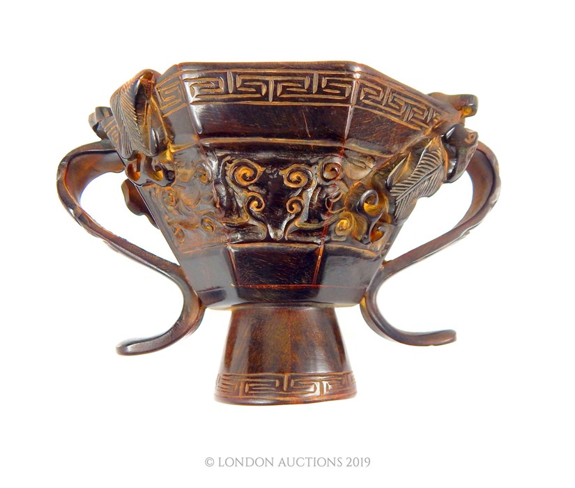 A Chinese Horn Libation Cup.