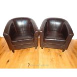 A Pair Of Leather Tub Chairs