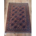 An Antique Russian Afghan Style Rug. 146 cm x 105 cm.