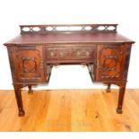 A 19th Century Desk After Chippendale.