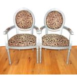 A Pair Of Silver Framed Upholstered Chairs.