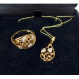 A 9 carat gold diamond Tree of Life pendant and chain. 2.5 grams plus 9 carat gold and Diamond