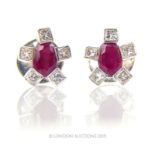 An 18 Carat Ruby Earrings With Diamond.