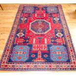A Persian Style Rug.