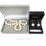 White Pearl Necklace Plus Tahitian Shell Pearl Earrings.