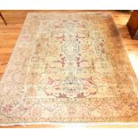 A Large Persian Triple Medallion Carpet.