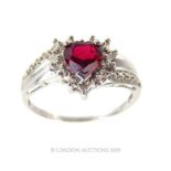 A White Gold Ruby And Diamond Ring.