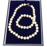 A Stunning Akoya White Pearl 18" necklace.