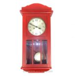 A Red Victorian Wall clock.