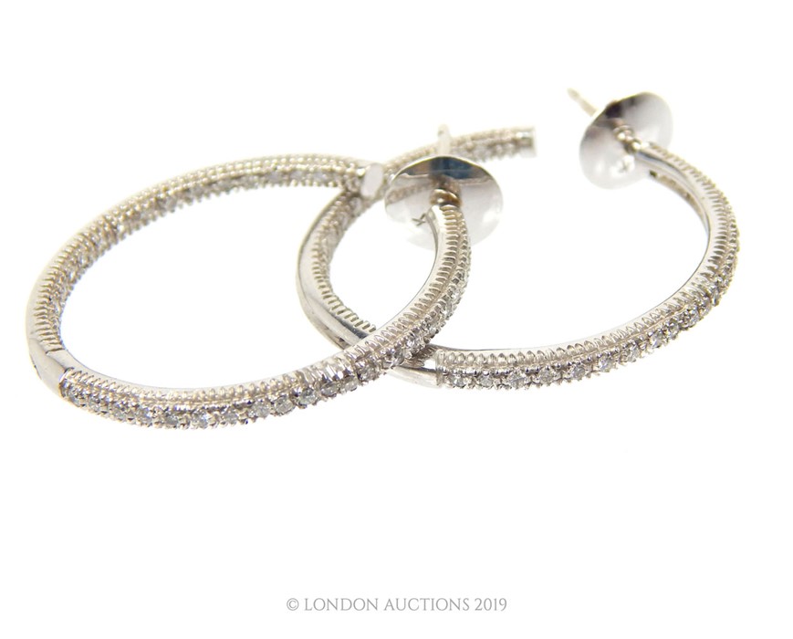 A pair Of 18 Carat Diamond Earrings. - Image 2 of 3