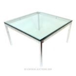 A Glass Top Chrome Coffee Table.