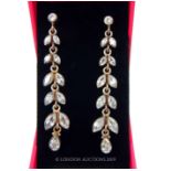 A Pair Of Silver And Cubic Zirconia Earrings.
