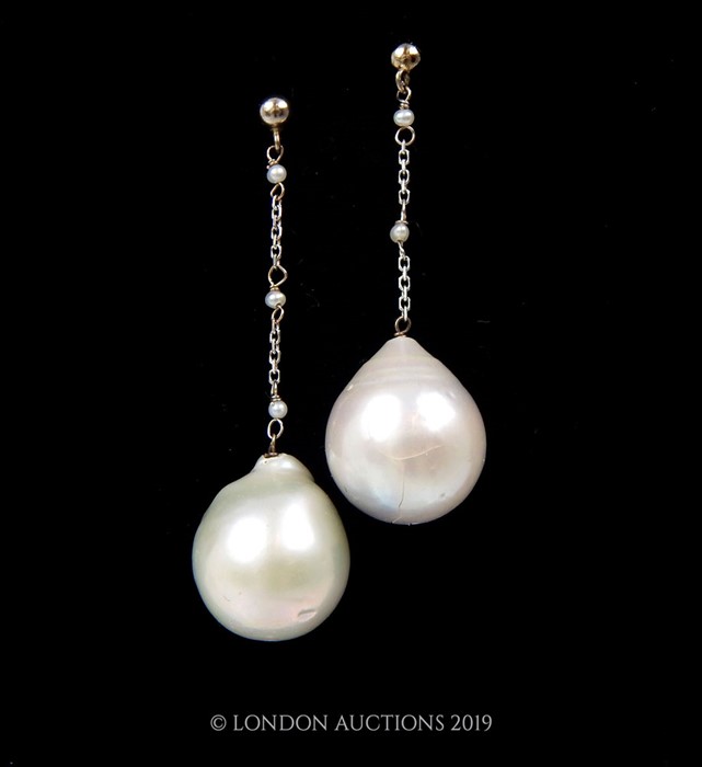 A Pair Of South Sea Baroque Drop Pearl Earrings.