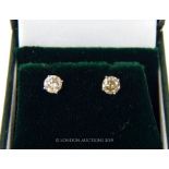 A Pair Of White Gold Stud Earrings.