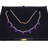 A Seed Pearl And Faceted Teardrop Purple Synthetic Stone Necklace.