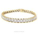 A 9 Carat Diamond Tennis Bracelet.