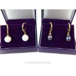 Two Pairs Cultural Pearl Earrings.